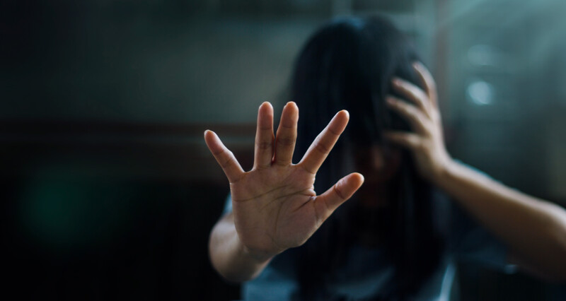 woman hand block reach covered face