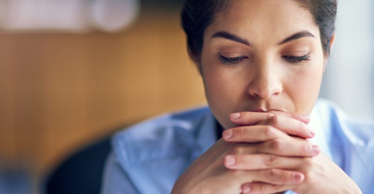 Under pressure...a young businesswoman looking stressed at the office.